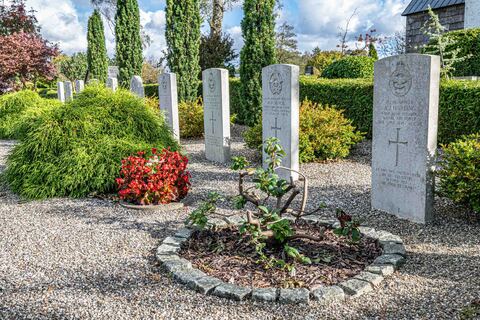 Aaresttup Kirke, Denmark. Graves of the crew of Liberator GR VIII KH410