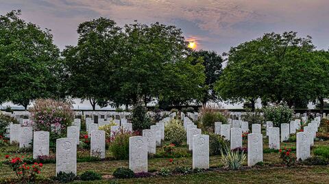 Sunset over the Canadian War Cemetery, Bretteville-Sur-Laize, Cintheaux, France.