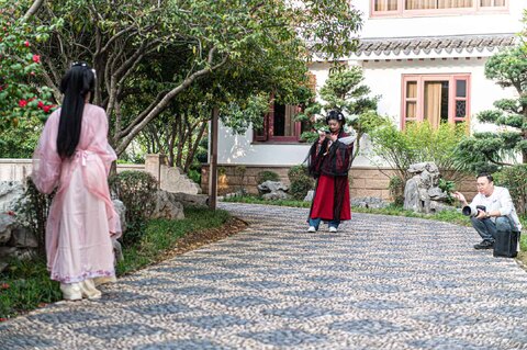 Traditional costume and makeup photoshoot in the hotel gardens